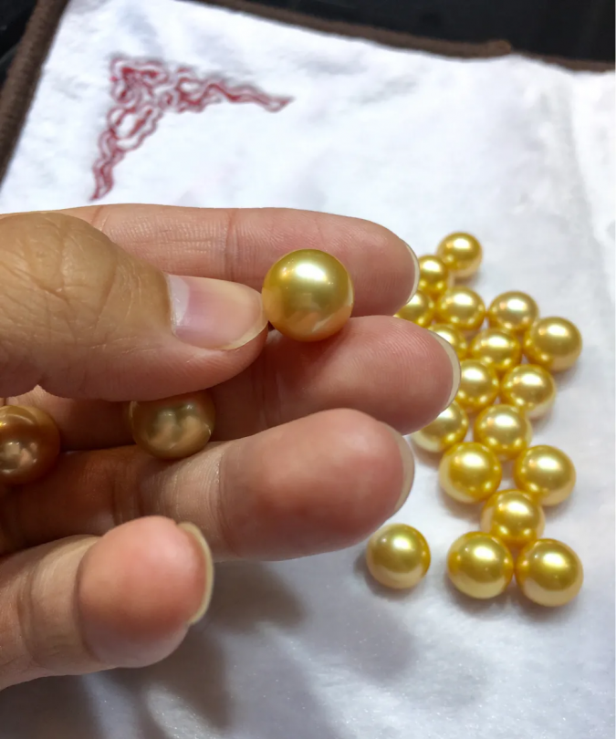 怎么区分天然珍珠和染色珍珠（怎么知道金色珍珠有没有染色）